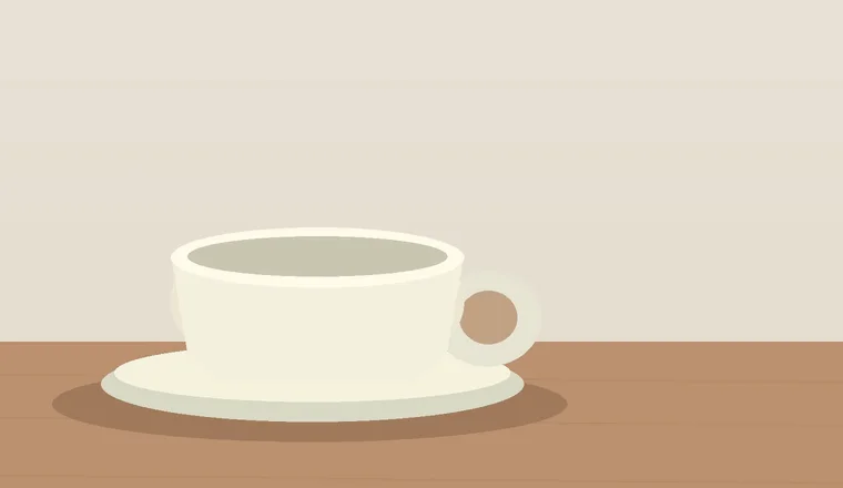 A silent close-up of the cup settling onto its saucer.